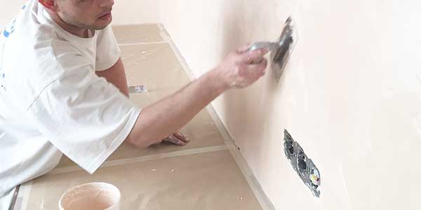 afwerkingslaag bepleisteren